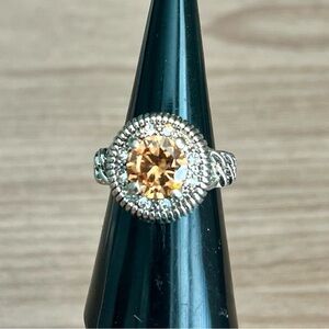 Elegant Gold-Toned Ring with Orange Gemstone